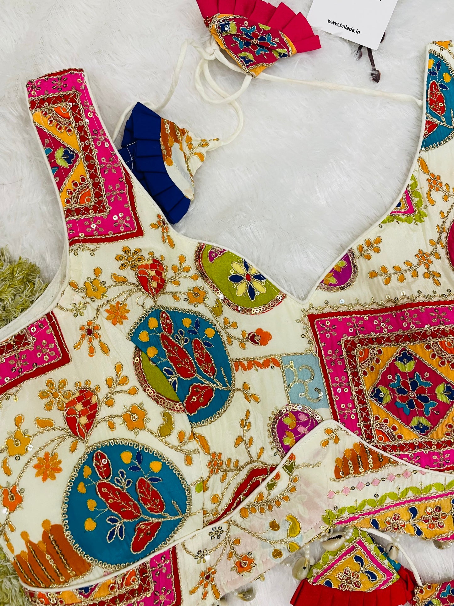 Off-White Multicolor Embroidered Sleeveless Blouse with Tassels