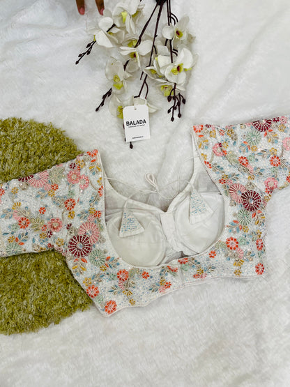 Off-White Multicolor Floral Embroidered Sleeveless Blouse with Tassels