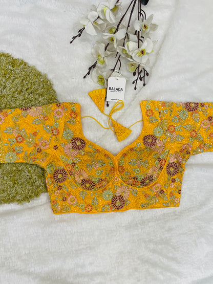Radiant Yellow Floral Embroidered Silk Blouse for Festive Celebrations